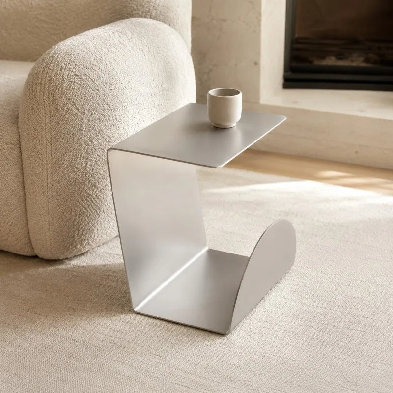 Arcus Brushed Steel Magazine Table