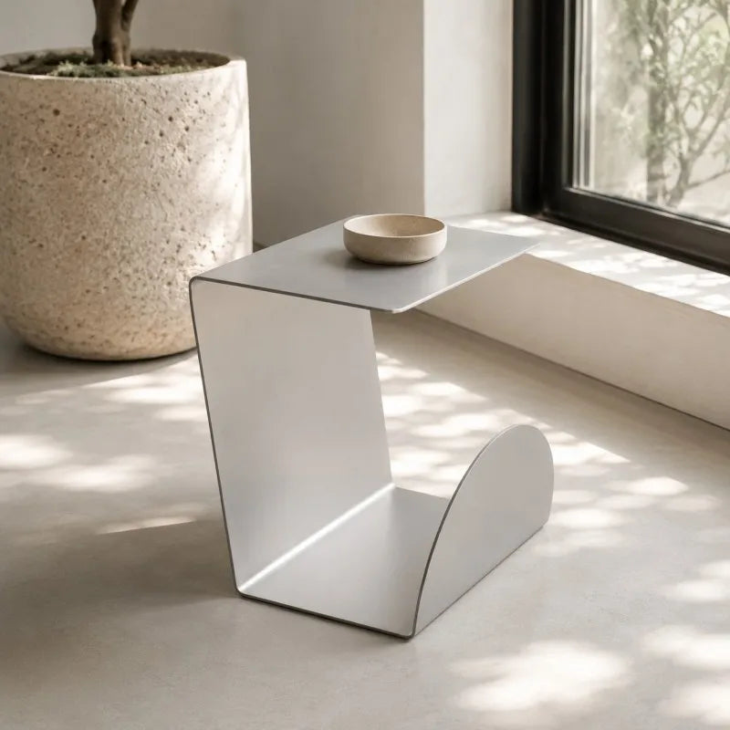 Arcus Brushed Steel Magazine Table